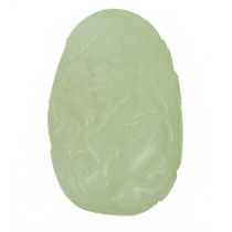 A Chinese pale celadon carved boulder.