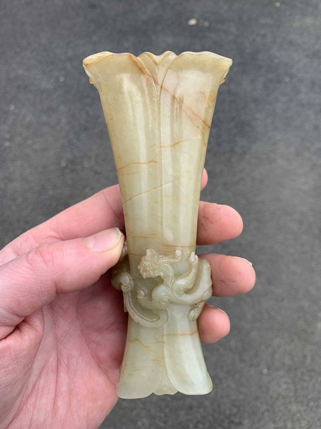 A Chinese pale green jade Gu vase, early Qing Dynasty. - Image 14 of 25