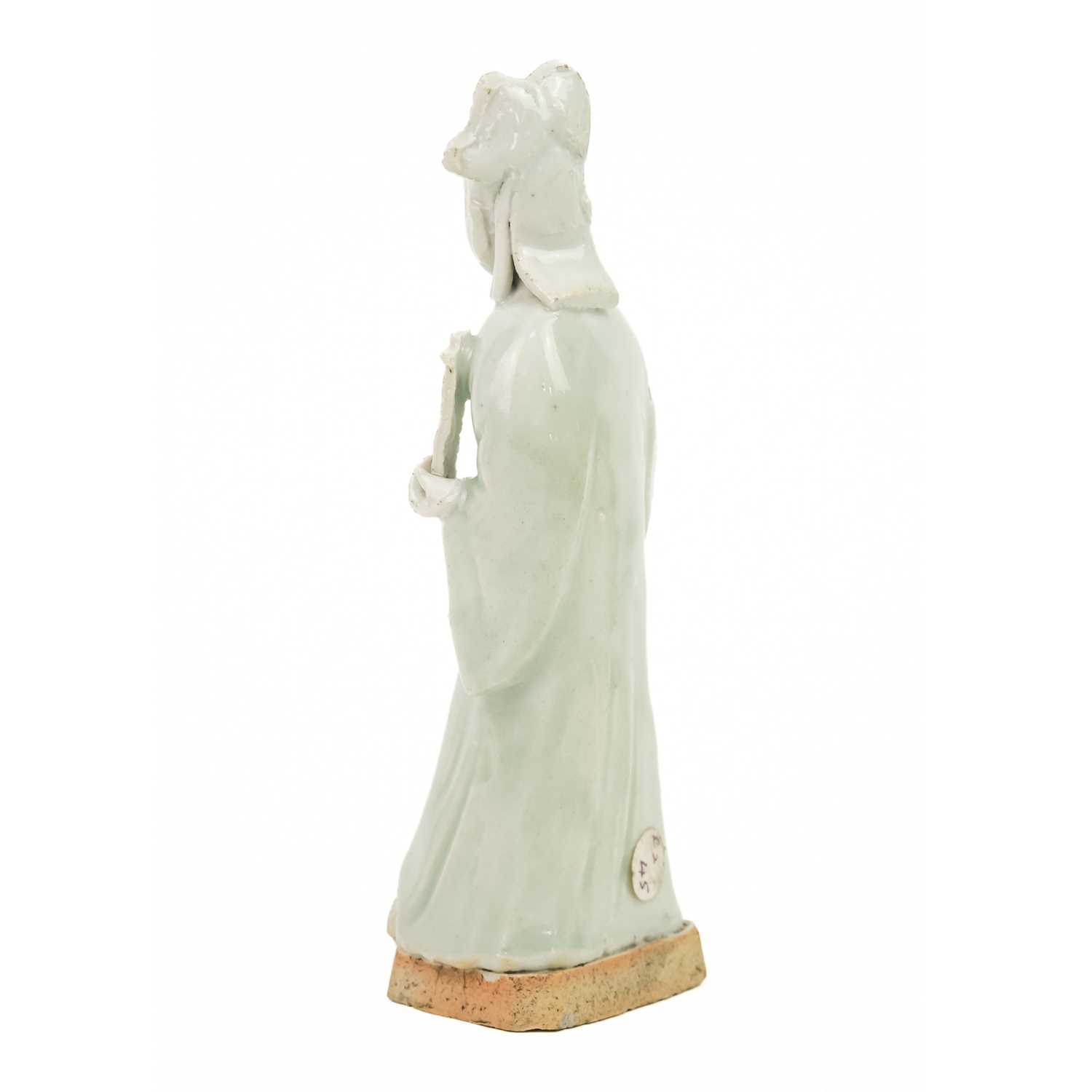 A pair of Chinese celadon figures of attendants, 19th century. - Image 7 of 16