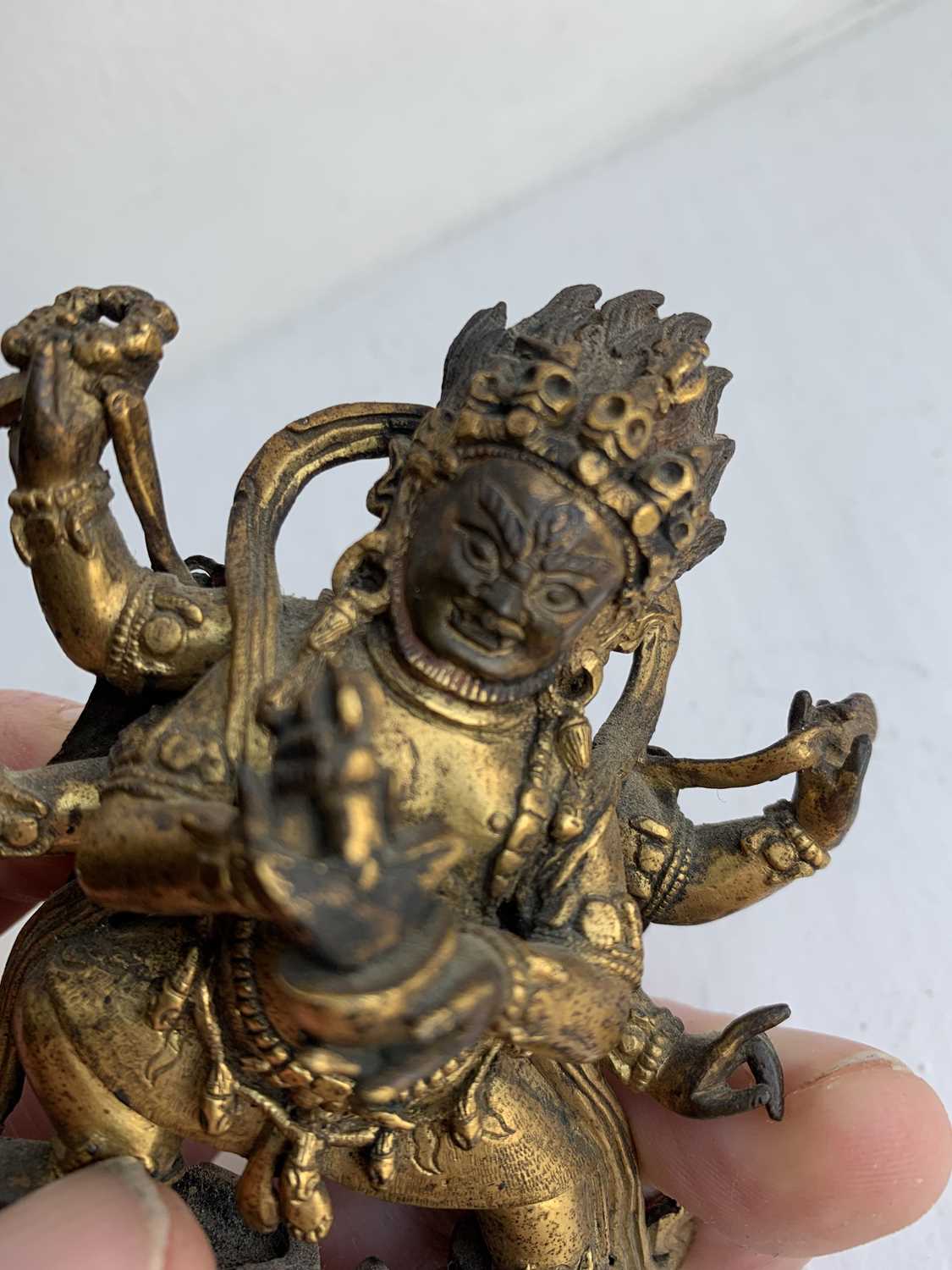 A Sino-Tibetan gilt bronze figure of Mahakala, 18th/19th century. - Image 17 of 22