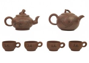 A Chinese Yixing pottery teapot.
