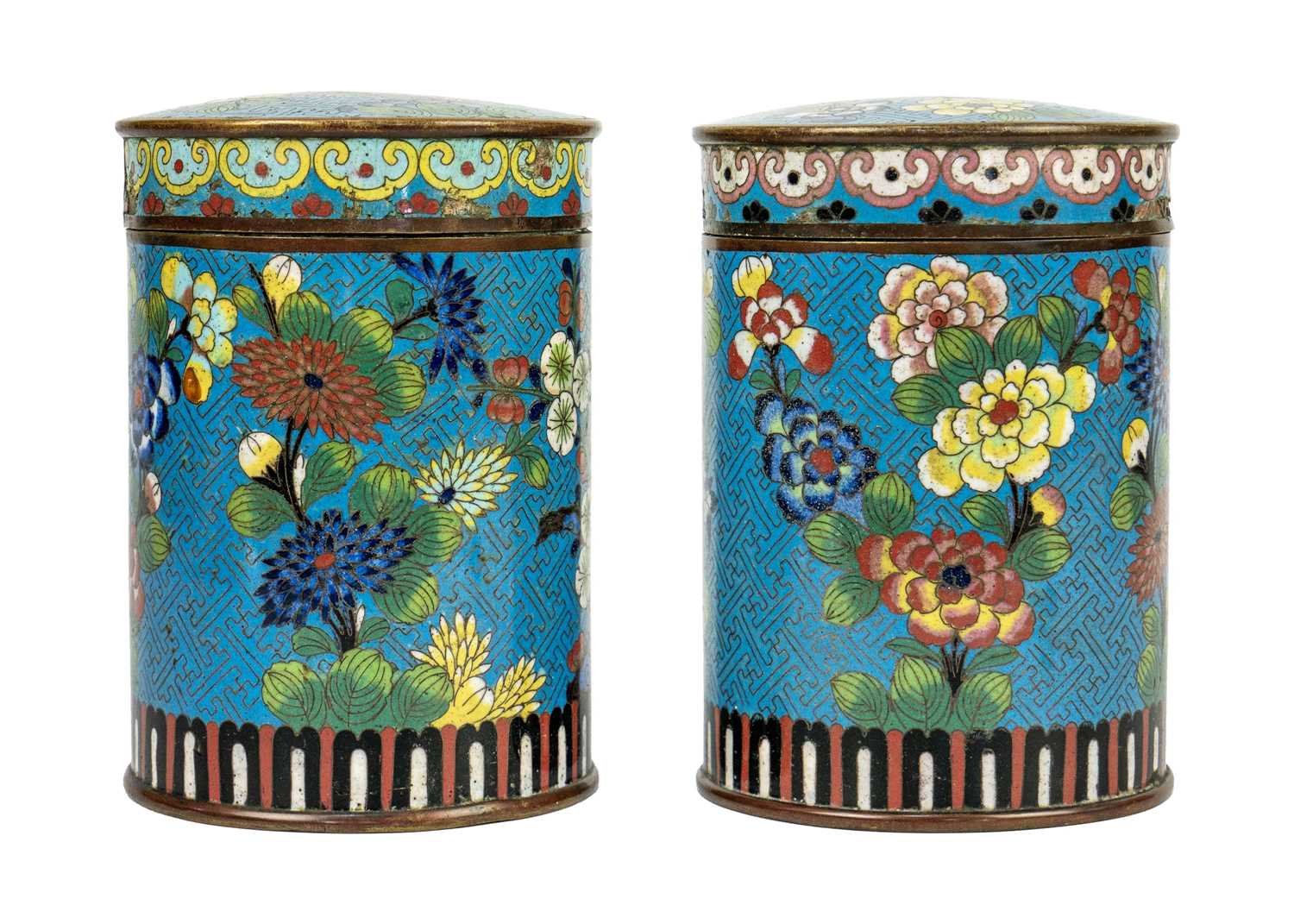 A pair of Chinese cloisonne cylindrical jars and covers, early 19th century.
