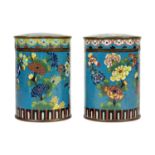 A pair of Chinese cloisonne cylindrical jars and covers, early 19th century.