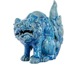 A Chinese turquoise glazed pottery 'Lion' dog, late Qing Dynasty, circa 1900.