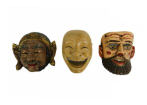 A Japanese carved wood Noh mask.