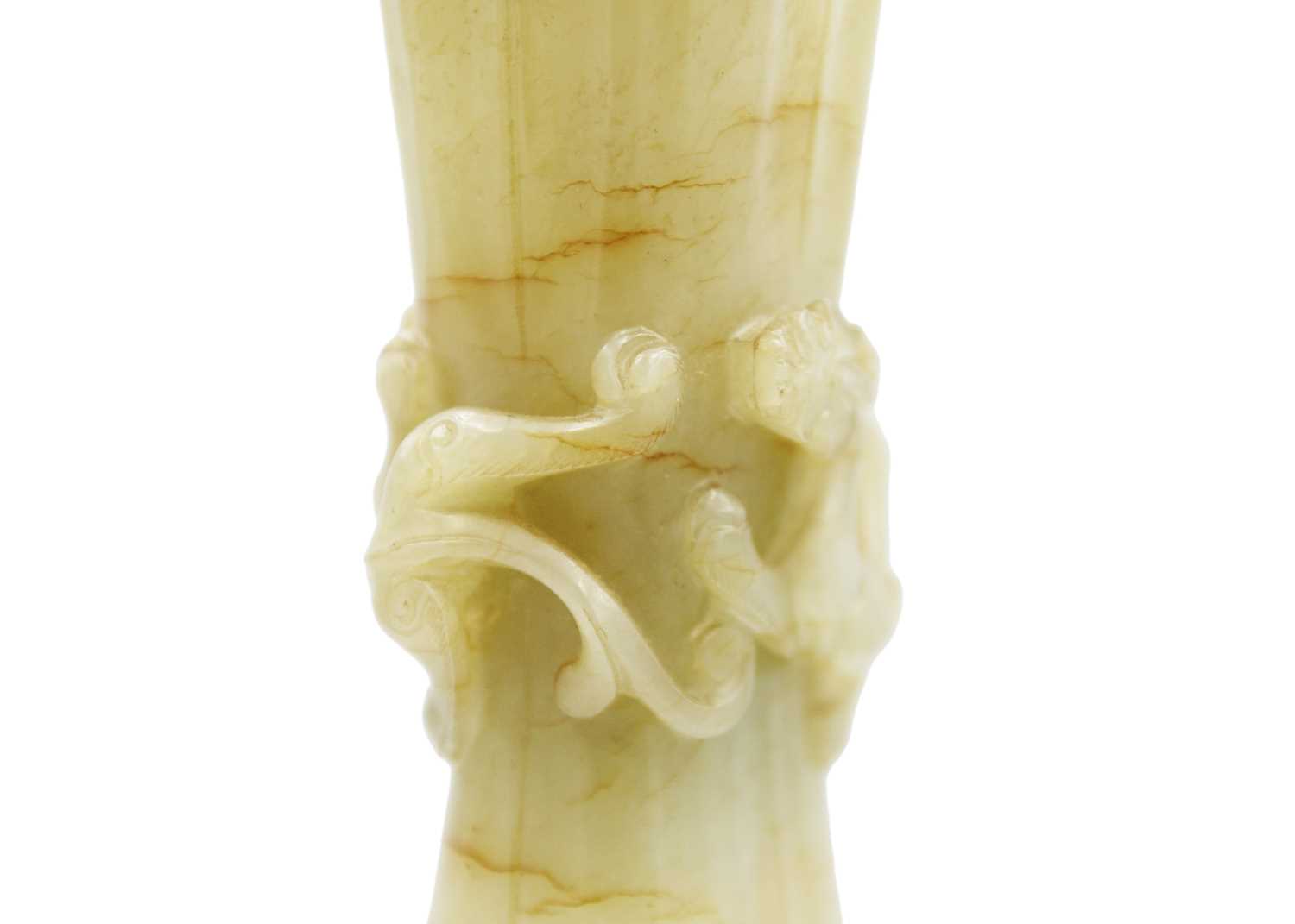 A Chinese pale green jade Gu vase, early Qing Dynasty. - Image 10 of 25