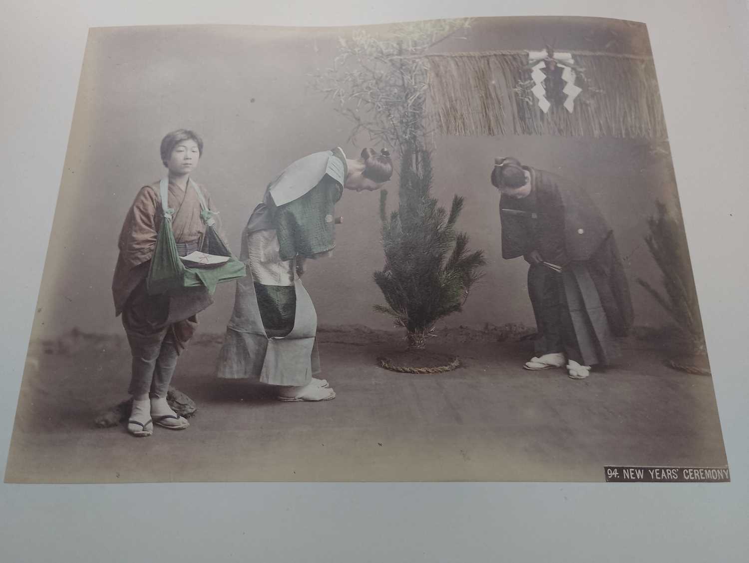 A Japanese hand coloured photo album with lacquer cover, Meiji period. - Image 51 of 52