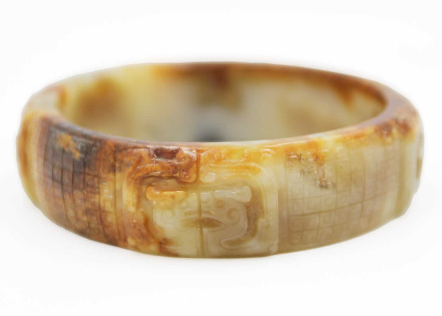 A Chinese carved jade bangle, probably Neolithic period. - Image 2 of 30
