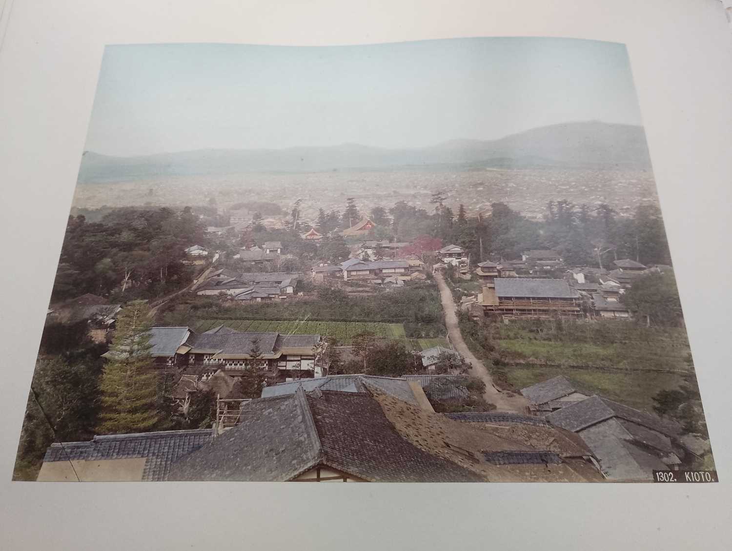 A Japanese hand coloured photo album with lacquer cover, Meiji period. - Image 35 of 52