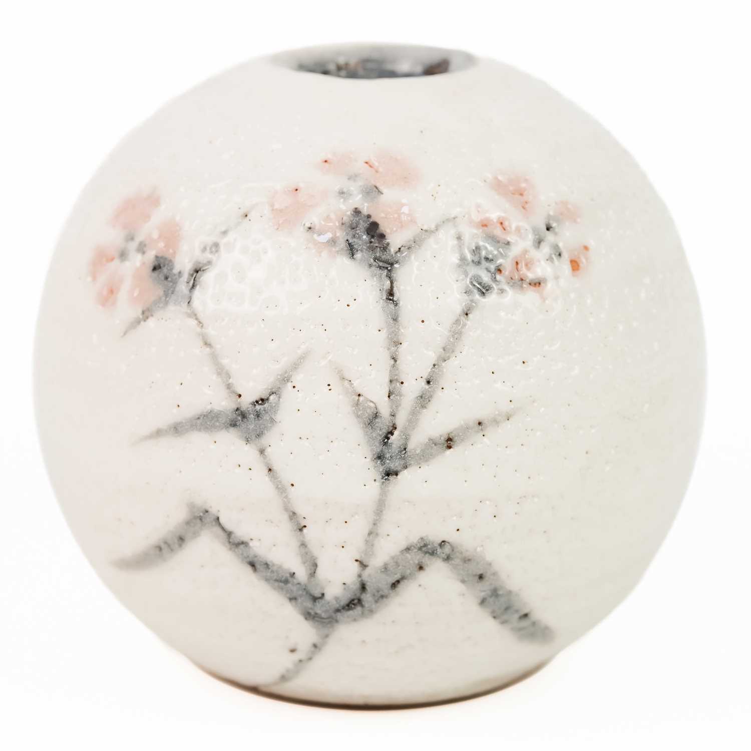 A Japanese white painted globular vase, 20th century.