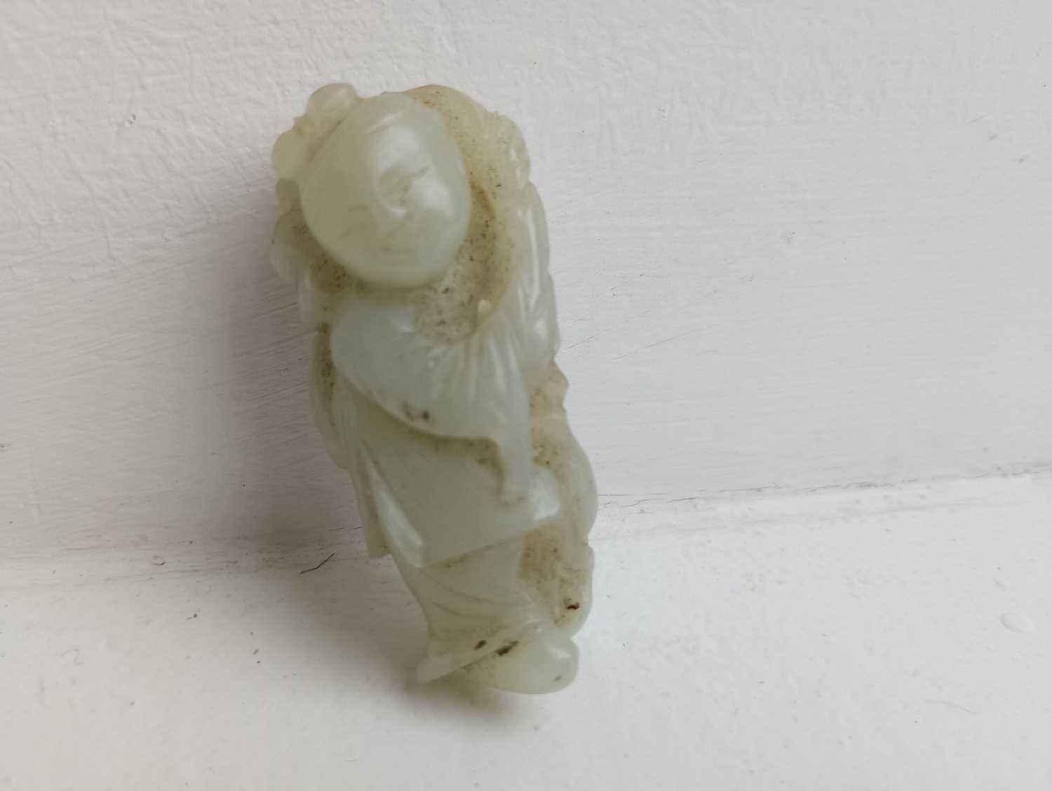 A Chinese carved jade figure of a boy, Qing Dynasty, 19th century, - Image 7 of 9