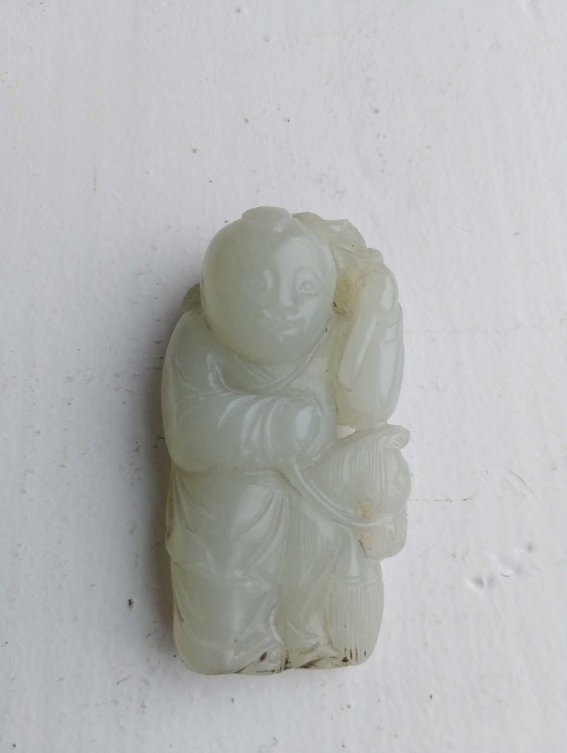 A Chinese celadon jade figure of a boy with hobby horse, Qing Dynasty, 19th century. - Image 5 of 7