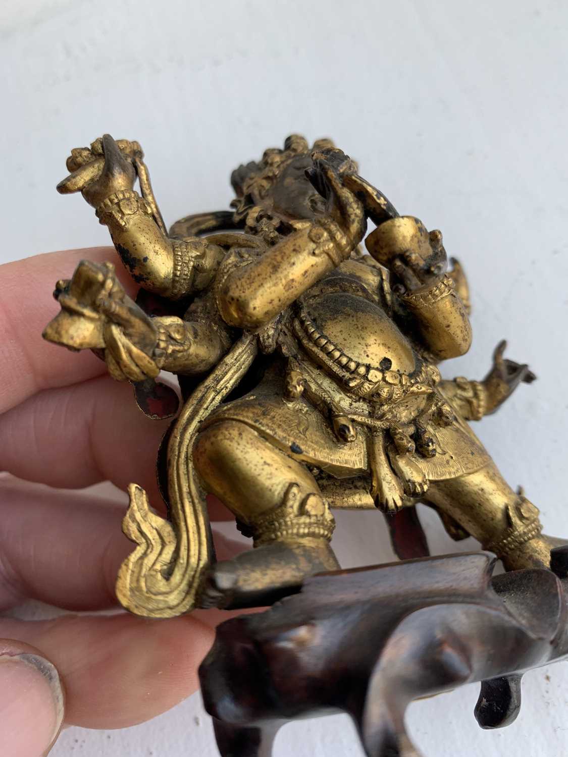 A Sino-Tibetan gilt bronze figure of Mahakala, 18th/19th century. - Image 7 of 22