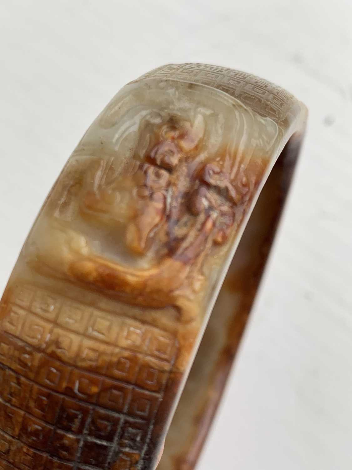 A Chinese carved jade bangle, probably Neolithic period. - Image 17 of 30