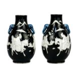 A pair of Chinese noire twin-handled ovoid vases, circa 1900.