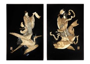 A pair of Japanese bone decorated ebonised panels, Meiji period.