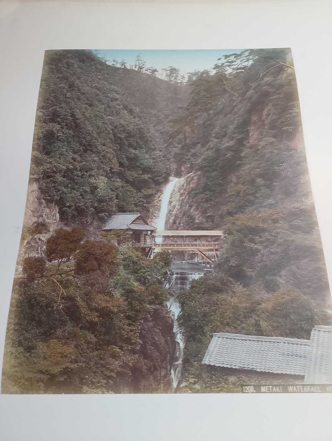 A Japanese hand coloured photo album with lacquer cover, Meiji period. - Image 31 of 52