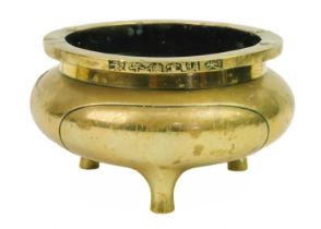 A Chinese bronze censer, Qing Dynasty, 19th century.