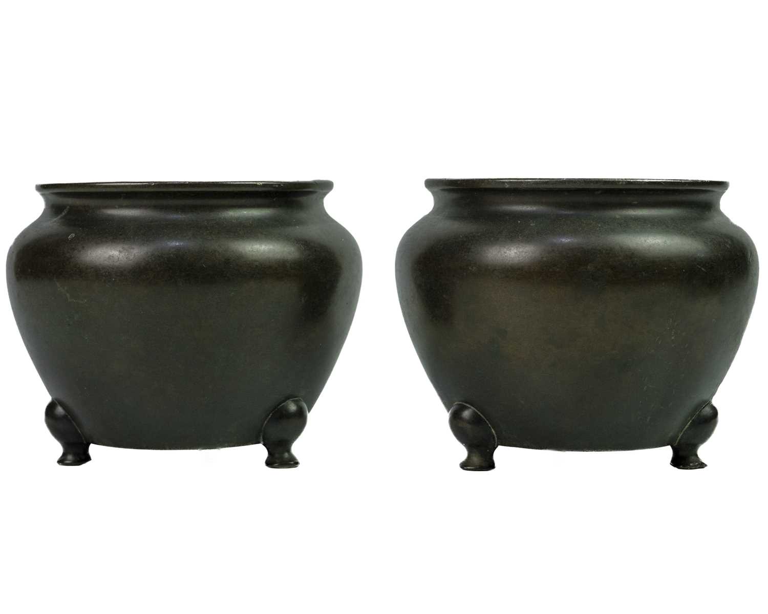 A pair of Chinese bronze censers, Qing Dynasty.