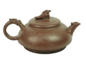 A Chinese Yixing teapot.
