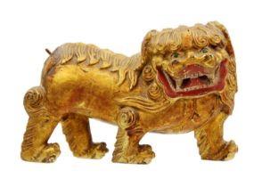 A Chinese carved giltwood dog of fo, 19th century