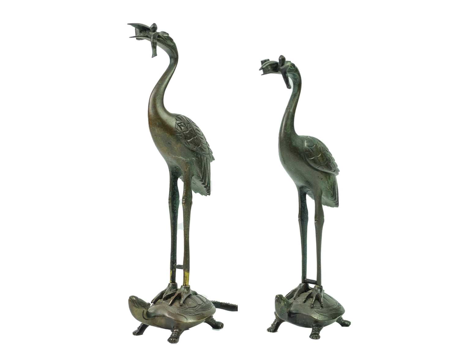 A pair of Japanese bronze figures of storks, Meiji period.