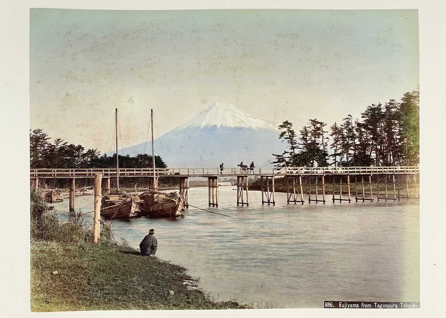 A Japanese hand coloured photo album with lacquer cover, Meiji period.