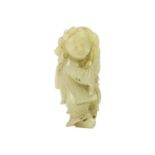 A Chinese carved jade figure of a boy, Qing Dynasty, 19th century,
