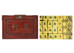 A mahogany cased mahjong set.