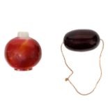 A large bakelite cherry amber bead,.