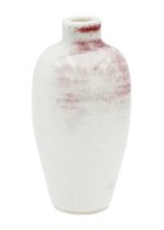 A Chinese peach bloom miniature baluster vase, 19th century.