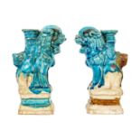 Two Chinese turquoise pottery dogs of fo joss stick holders, Ming Dynasty.