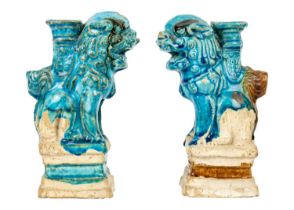 Two Chinese turquoise pottery dogs of fo joss stick holders, Ming Dynasty.