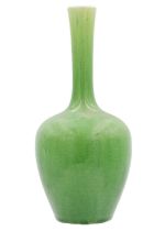 A Chinese green glazed monochrome bottle vase, Qing Dynasty, 19th century.