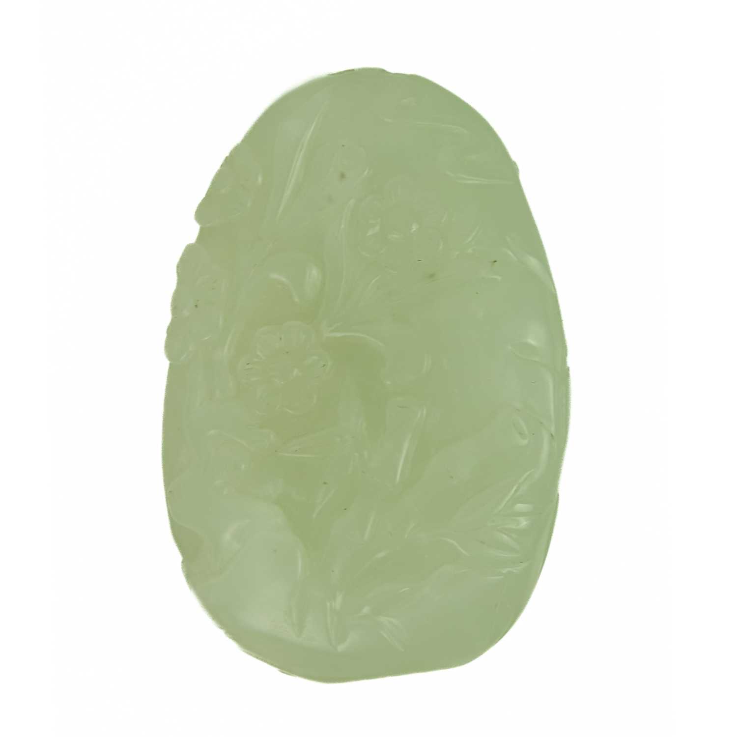 A Chinese pale celadon carved boulder. - Image 3 of 6