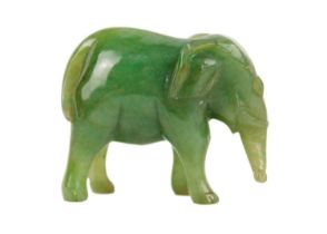 A Chinese spinach jade model of an elephant, late Qing Dynasty.