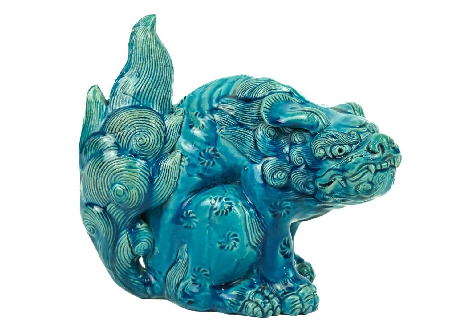 A Chinese turquoise glazed pottery 'Lion' dog, circa 1900, late Qing Dynasty.