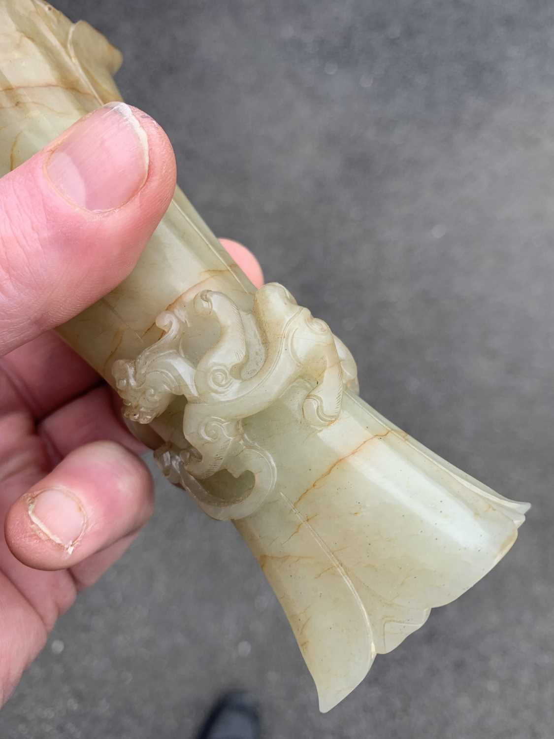 A Chinese pale green jade Gu vase, early Qing Dynasty. - Image 19 of 25