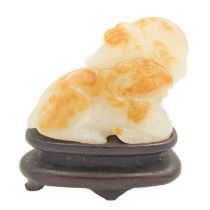 A Chinese carved jade model of a ram, Qing Dynasty, 19th century.