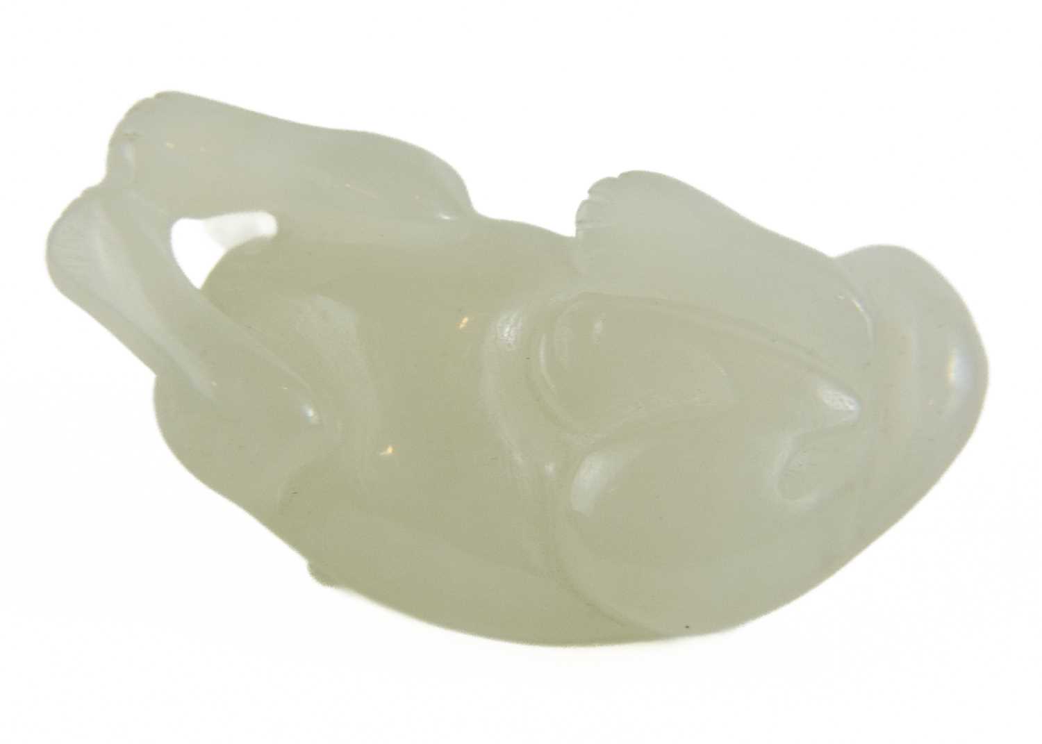 A Chinese jade model of a reclining dog, late Qing Dynasty. - Image 5 of 7