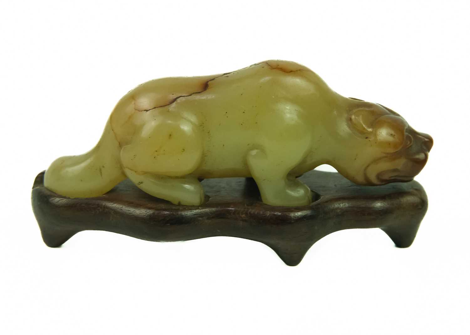 A Chinese russet jade tiger, Qing Dynasty, 19th century. - Image 3 of 25