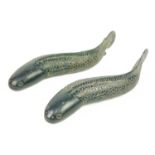 A pair of Chinese bronze models of fish.