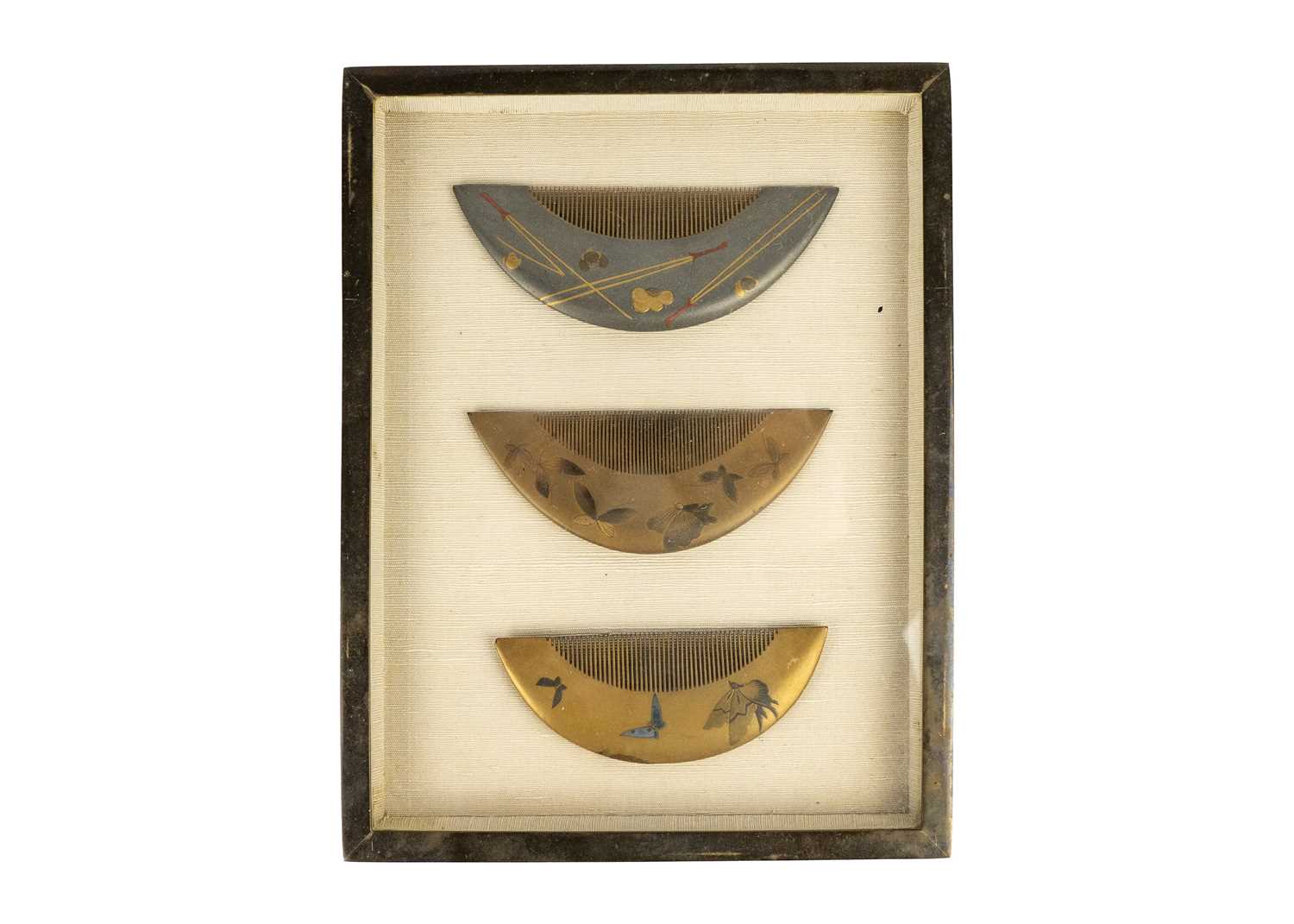 A collection of three Japanese gold lacquer combs, Meiji period.