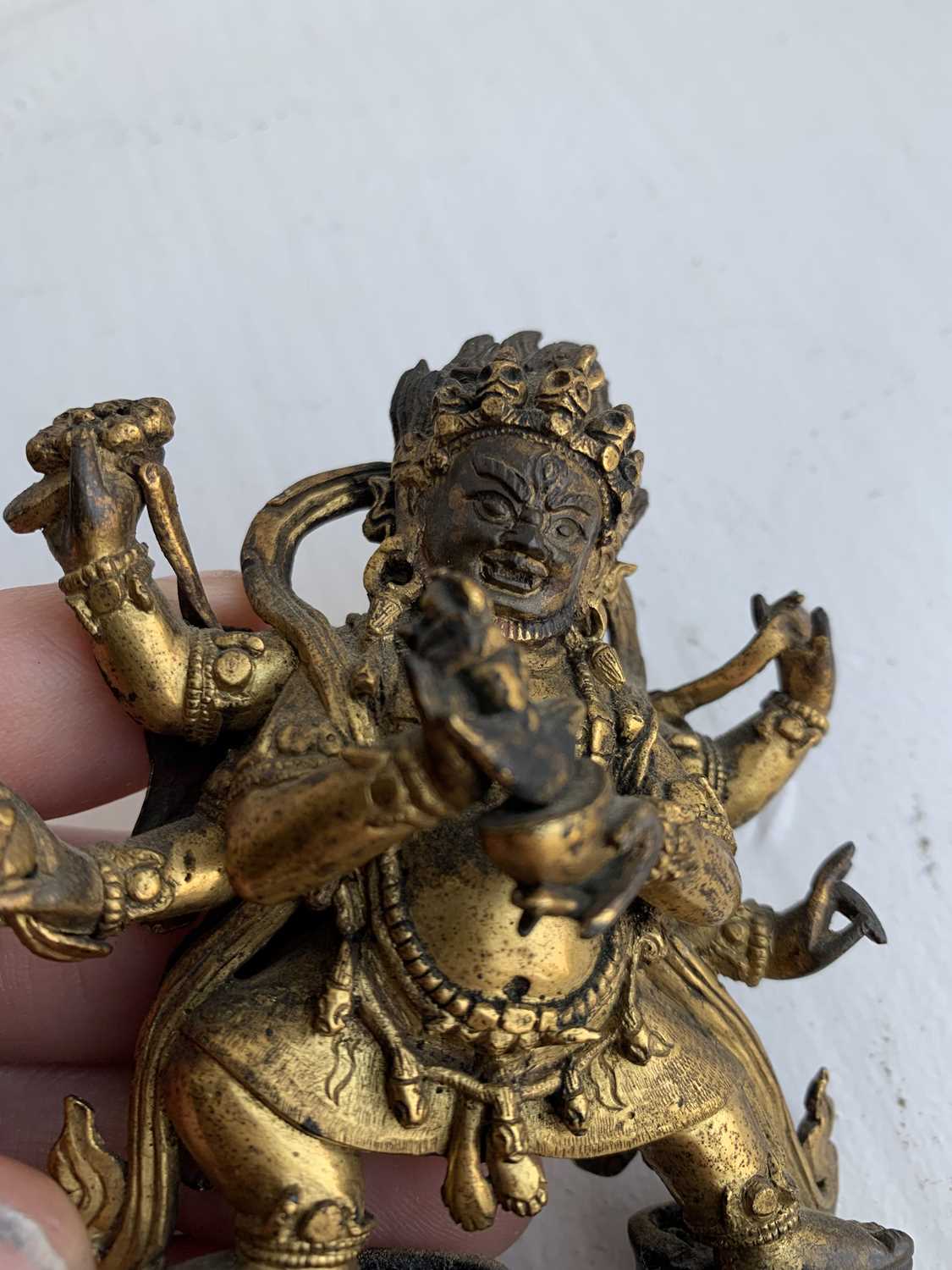 A Sino-Tibetan gilt bronze figure of Mahakala, 18th/19th century. - Image 21 of 22