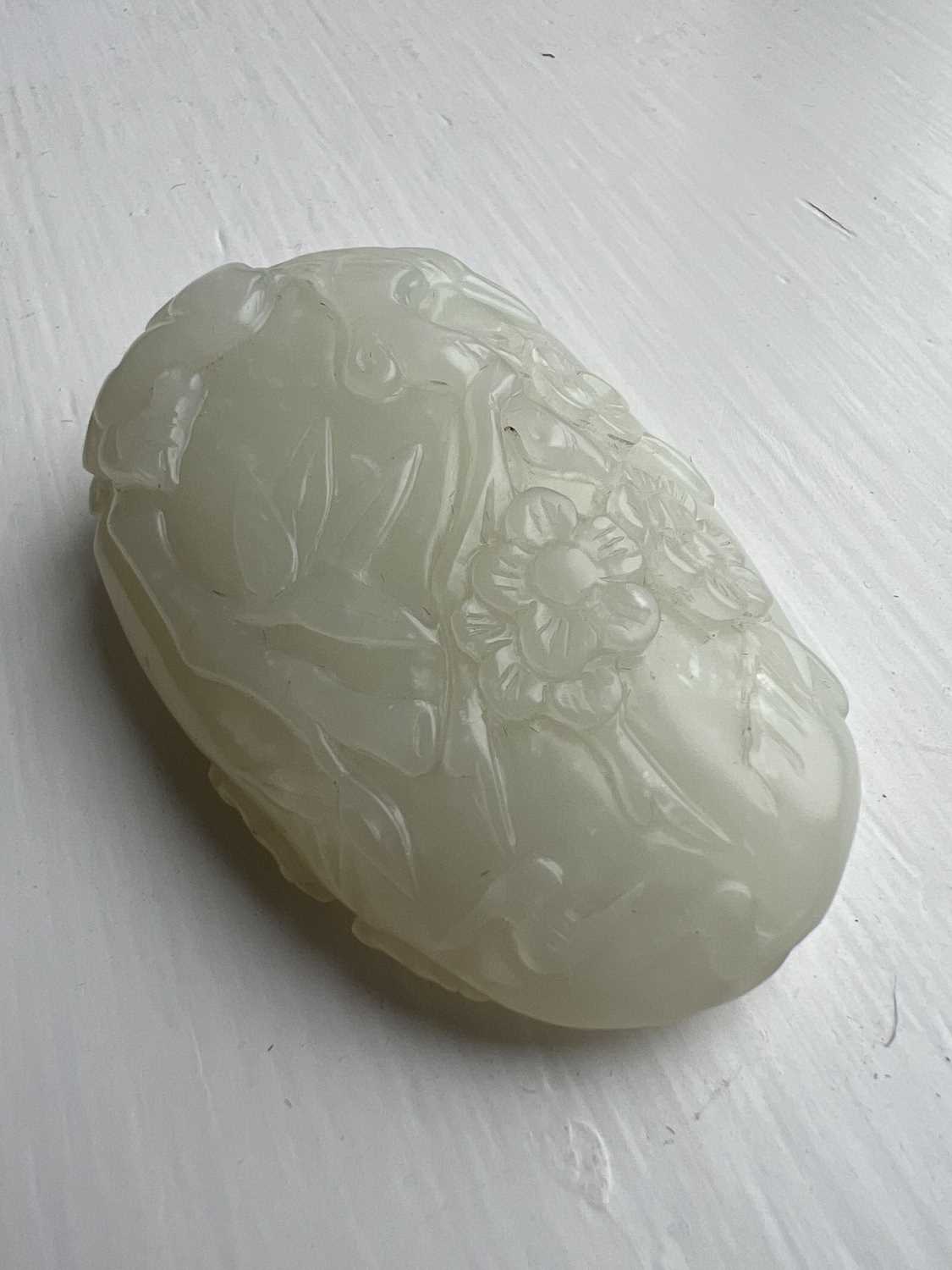 A Chinese pale celadon carved boulder. - Image 6 of 6