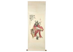 A Chinese painted scroll depicting a warrior and tiger, early 20th century.