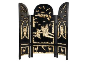 A Chinese ebonised and carved bone folding table screen, early 20th century.