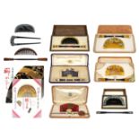 Six Japanese cased comb and kogai sets.