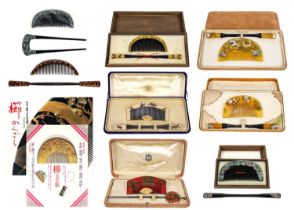 Six Japanese cased comb and kogai sets.