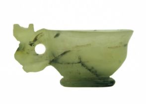 A small Chinese jade and black nephrite libation cup, Qing Dynasty.